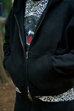 Black hoodie with panther design and leopard print trim