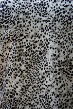 Close-up of a fabric with a cheetah print pattern